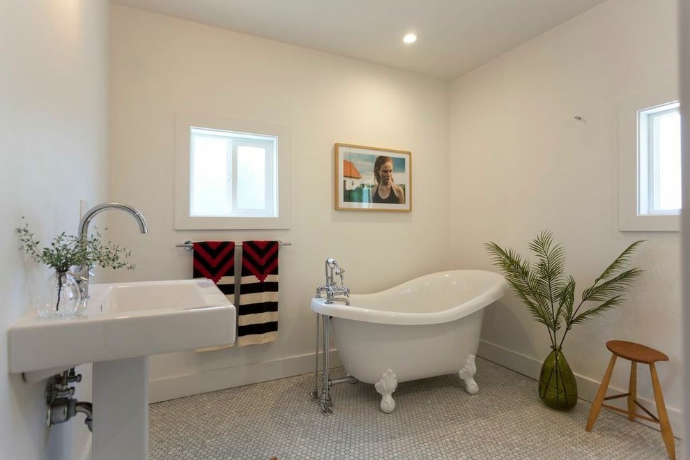 Inspiration for an eclectic mosaic tile floor claw-foot bathtub remodel in Los Angeles with a pedestal sink