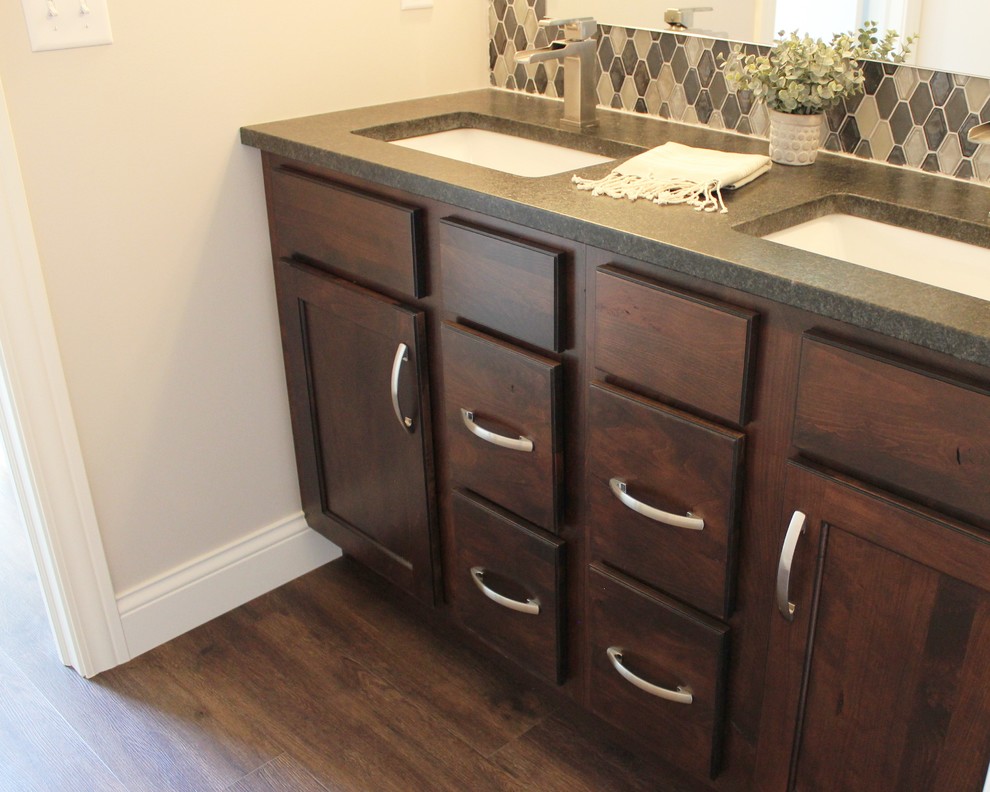 This is an example of a classic bathroom in Other with grey cabinets.