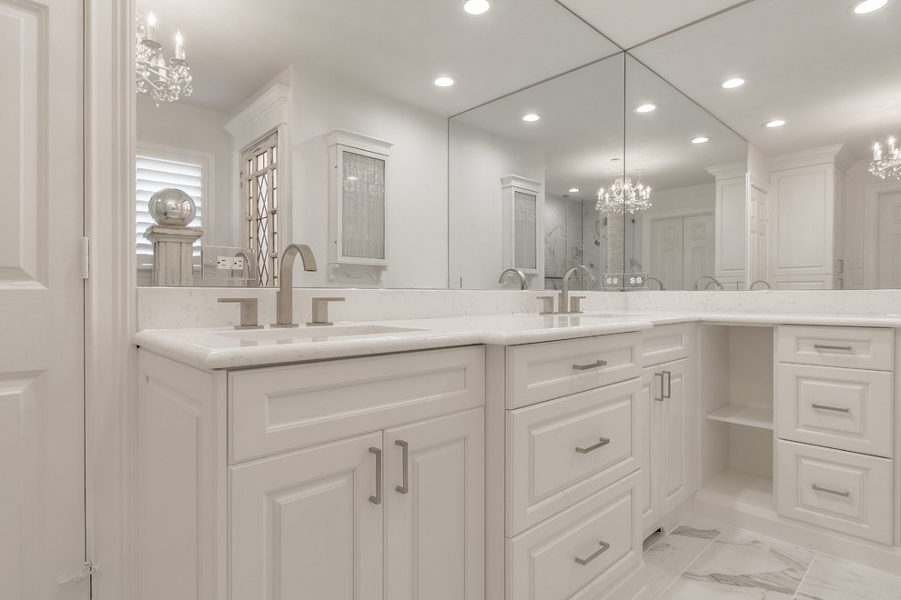 Inspiration for a large contemporary master gray tile, white tile and stone tile marble floor alcove shower remodel in Dallas with raised-panel cabinets, white cabinets, white walls, an undermount sink and marble countertops