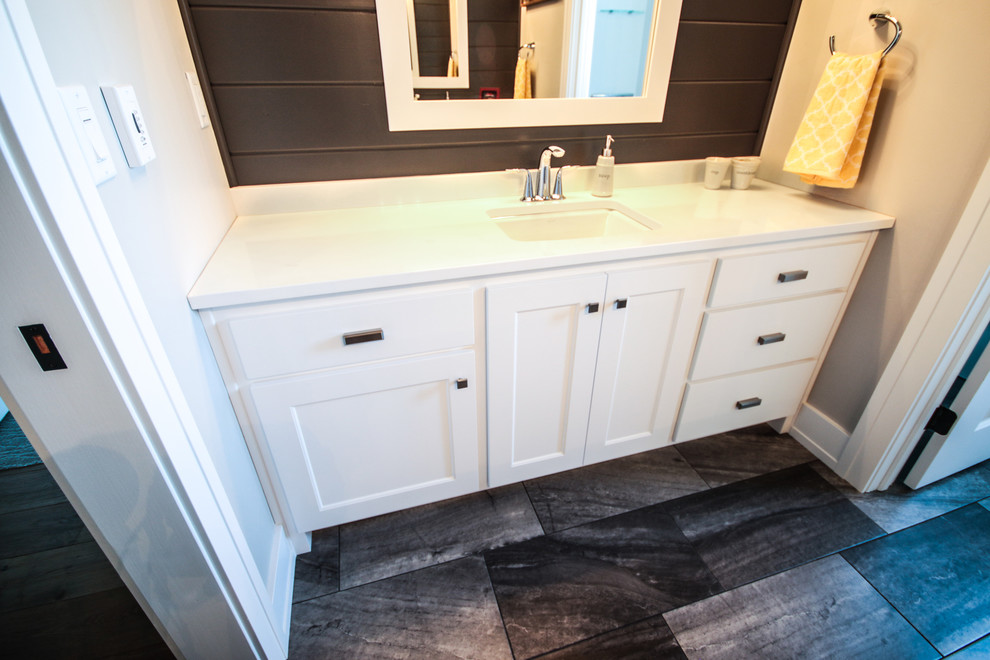 Bathroom - mid-sized traditional 3/4 ceramic tile bathroom idea in Other with an undermount sink, shaker cabinets, white cabinets, quartz countertops and beige walls