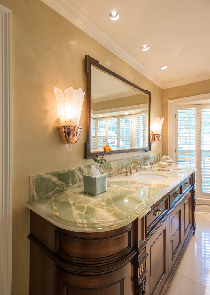 This is an example of a large classic ensuite bathroom in Dallas with a submerged sink, beige tiles, beige walls and marble flooring.