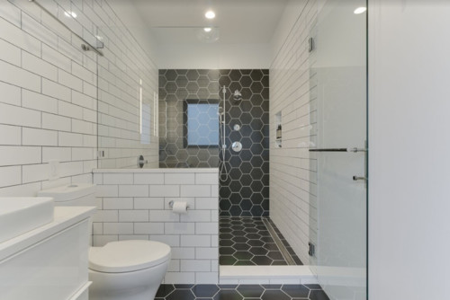 black hexagon tile shower