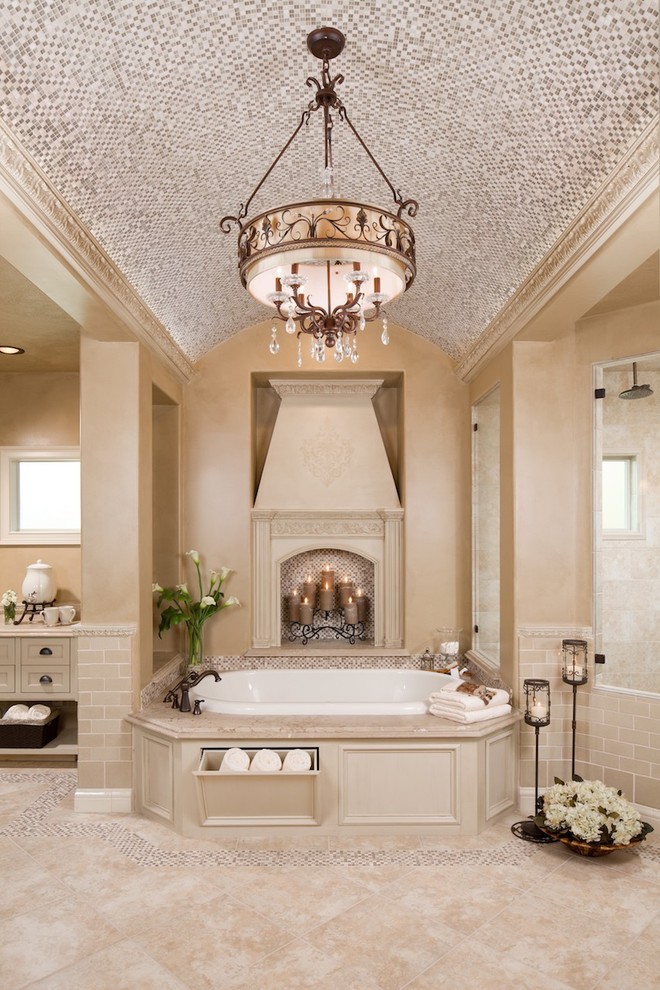 Drop-in bathtub - large traditional master mosaic tile and beige tile travertine floor and beige floor drop-in bathtub idea in Houston with beaded inset cabinets, beige cabinets and beige walls