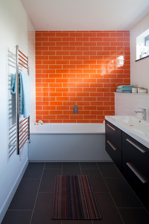 Playful Orange Subway Bathroom Accent Wall