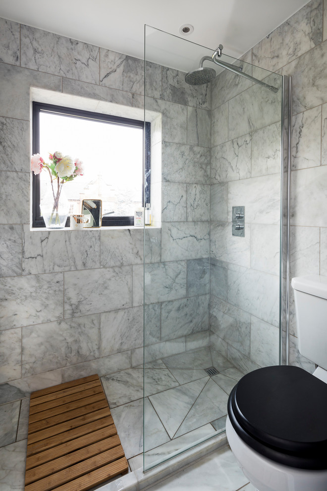 Small traditional shower room bathroom in London with a walk-in shower, a two-piece toilet, grey tiles, ceramic tiles, grey walls, ceramic flooring, a pedestal sink, grey floors and an open shower.