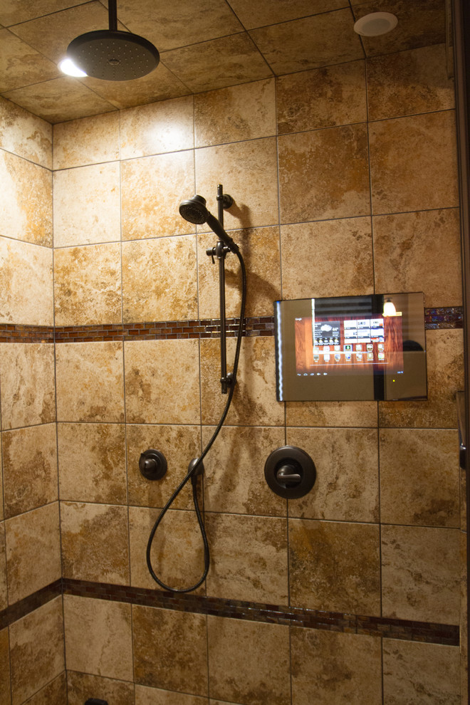 На фото: главная ванная комната среднего размера в стиле модернизм с накладной ванной, угловым душем, коричневой плиткой, керамогранитной плиткой, фасадами с утопленной филенкой, светлыми деревянными фасадами, коричневыми стенами, полом из керамогранита, столешницей терраццо, коричневым полом, душем с распашными дверями и врезной раковиной с