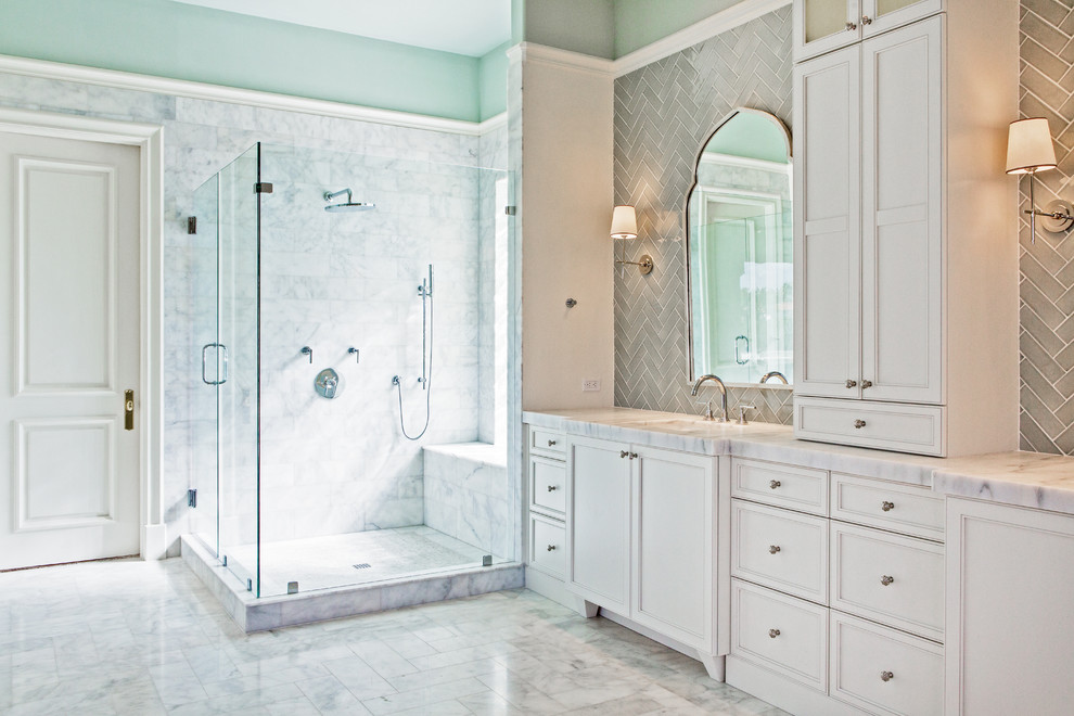 Bathroom - huge transitional master white tile and stone tile marble floor bathroom idea in Miami with an undermount sink, recessed-panel cabinets, white cabinets, marble countertops, a one-piece toilet and green walls