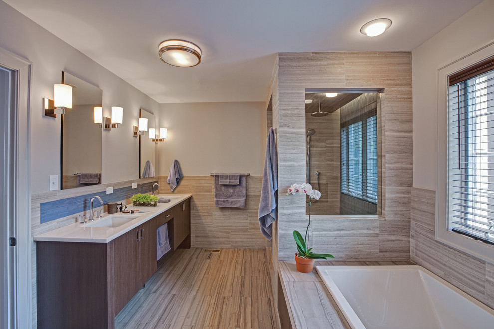 Inspiration for a contemporary alcove shower remodel in Chicago with an undermount sink and quartzite countertops