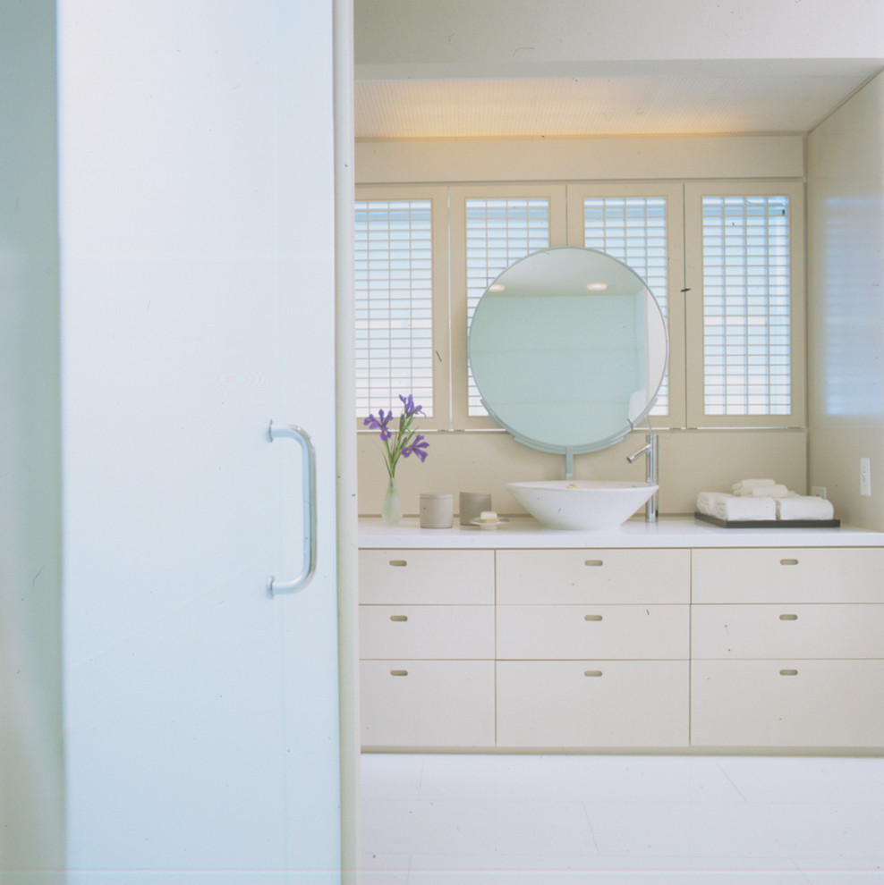 This is an example of a contemporary bathroom in Chicago with a vessel sink.