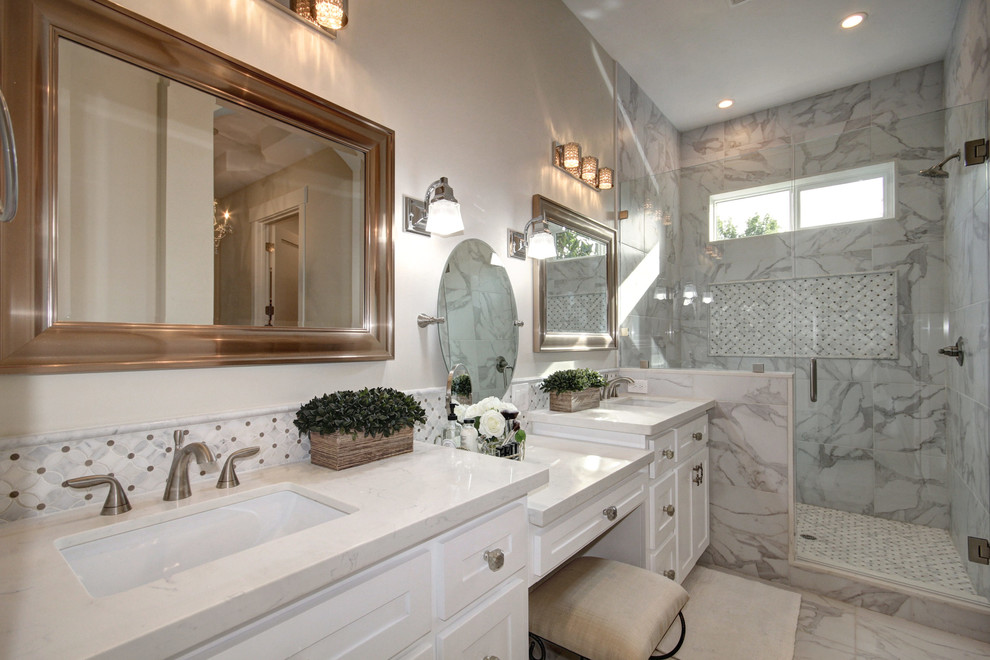 Example of a mid-sized classic master gray tile and ceramic tile ceramic tile, gray floor and single-sink bathroom design in Sacramento with white cabinets, a one-piece toilet, beige walls, an undermount sink, quartzite countertops, a hinged shower door, white countertops and a built-in vanity