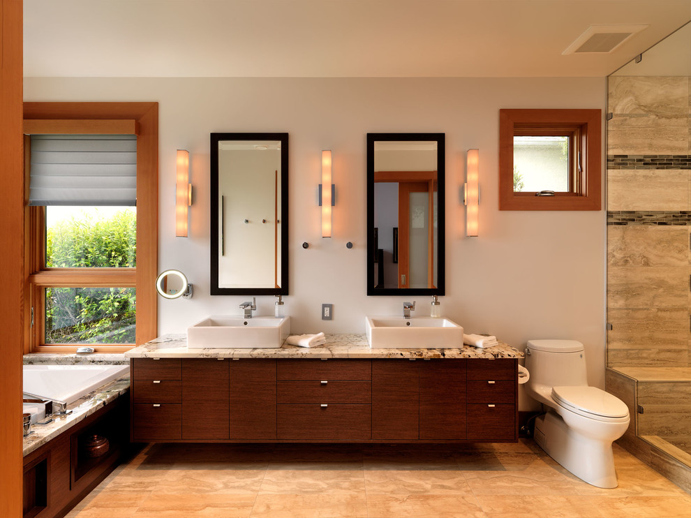 Design ideas for a contemporary bathroom in Vancouver with a vessel sink and feature lighting.