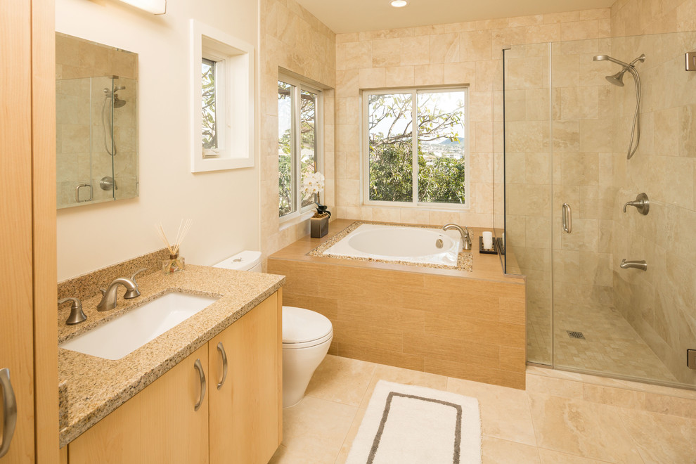 Mid-sized asian master beige tile and porcelain tile porcelain tile bathroom photo in Hawaii with an undermount sink, flat-panel cabinets, light wood cabinets, granite countertops and beige walls