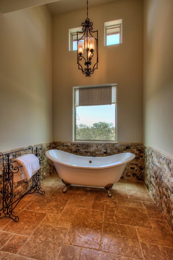 Example of a tuscan bathroom design in Austin