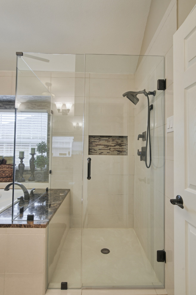 Inspiration for a medium sized classic ensuite bathroom in Dallas with raised-panel cabinets, dark wood cabinets, a built-in bath, a corner shower, beige walls, ceramic flooring, a submerged sink and granite worktops.
