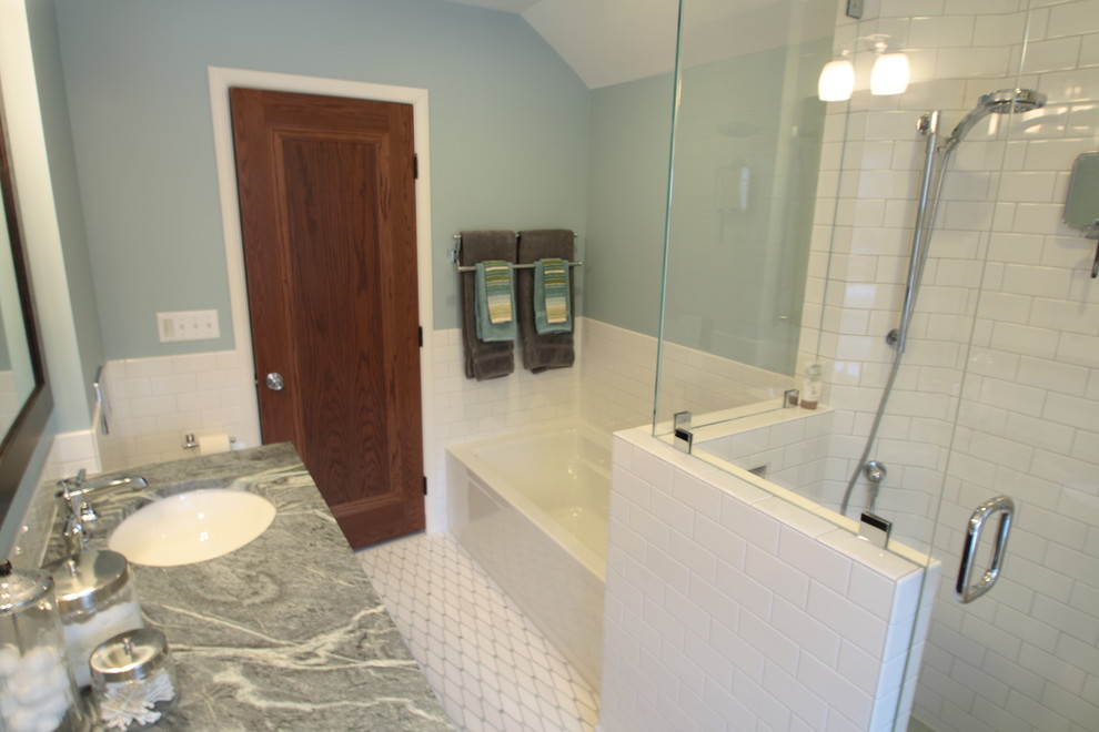 This is an example of a medium sized contemporary bathroom in Seattle with freestanding cabinets, brown cabinets, an alcove bath, a double shower, a wall mounted toilet, white tiles, porcelain tiles, blue walls, marble flooring, a submerged sink, soapstone worktops, white floors, a hinged door and green worktops.
