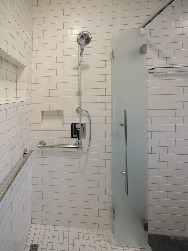 Walk-in shower - large modern master white tile and subway tile linoleum floor and gray floor walk-in shower idea in Houston with flat-panel cabinets, light wood cabinets, a one-piece toilet, white walls, a drop-in sink, quartzite countertops and gray countertops