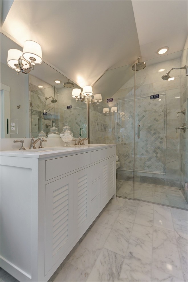 Walk-in shower - mid-sized transitional master multicolored tile and subway tile marble floor and white floor walk-in shower idea in St Louis with louvered cabinets, white cabinets, a one-piece toilet, yellow walls, a vessel sink, quartz countertops and a hinged shower door