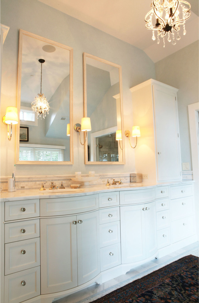 Inspiration for a farmhouse bathroom remodel in DC Metro with an undermount sink, shaker cabinets, white cabinets, marble countertops and blue walls