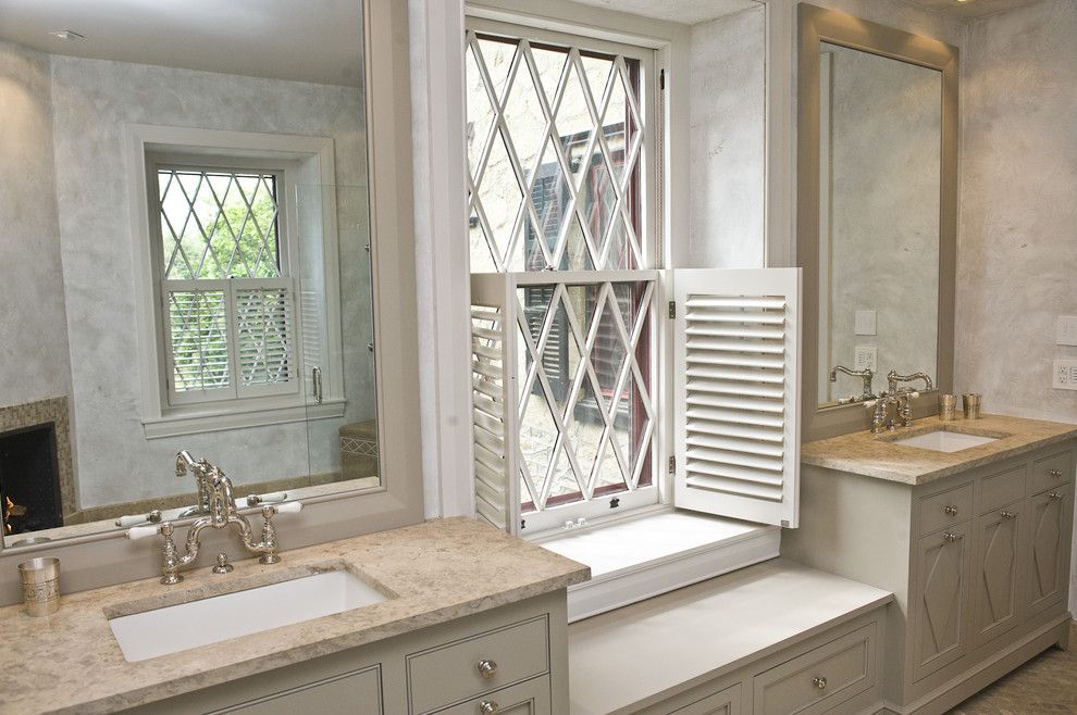 Inspiration for a classic bathroom in Philadelphia with limestone worktops and metro tiles.