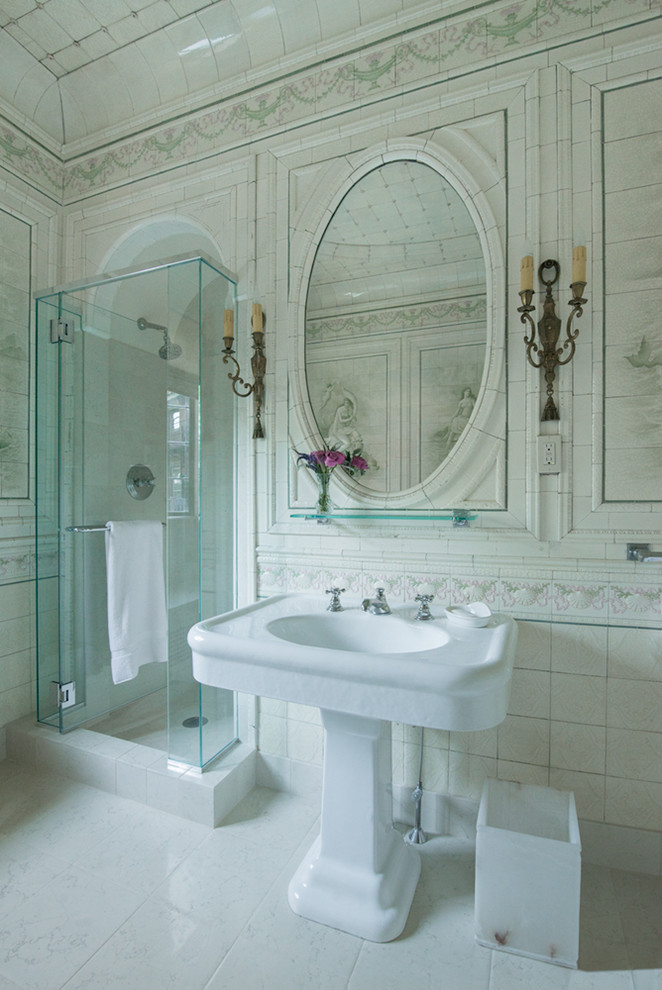 Large classic bathroom in Providence with a pedestal sink, a freestanding bath, an alcove shower, a two-piece toilet, white tiles, ceramic tiles, white walls and limestone flooring.