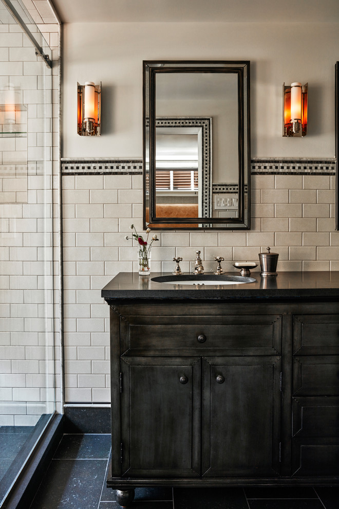 Inspiration for a small classic ensuite bathroom in Philadelphia with a console sink, freestanding cabinets, grey cabinets, granite worktops, an alcove shower, a one-piece toilet, black and white tiles, porcelain tiles, white walls and porcelain flooring.