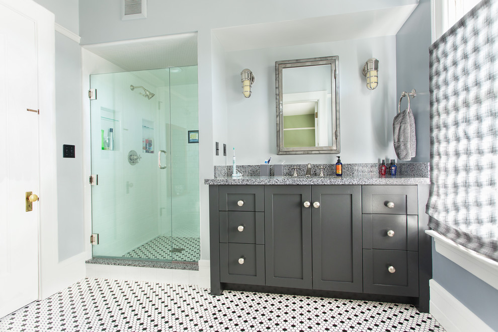 This is an example of a medium sized classic bathroom in San Luis Obispo with a submerged sink, freestanding cabinets, an alcove shower, a one-piece toilet, ceramic tiles, blue walls and ceramic flooring.
