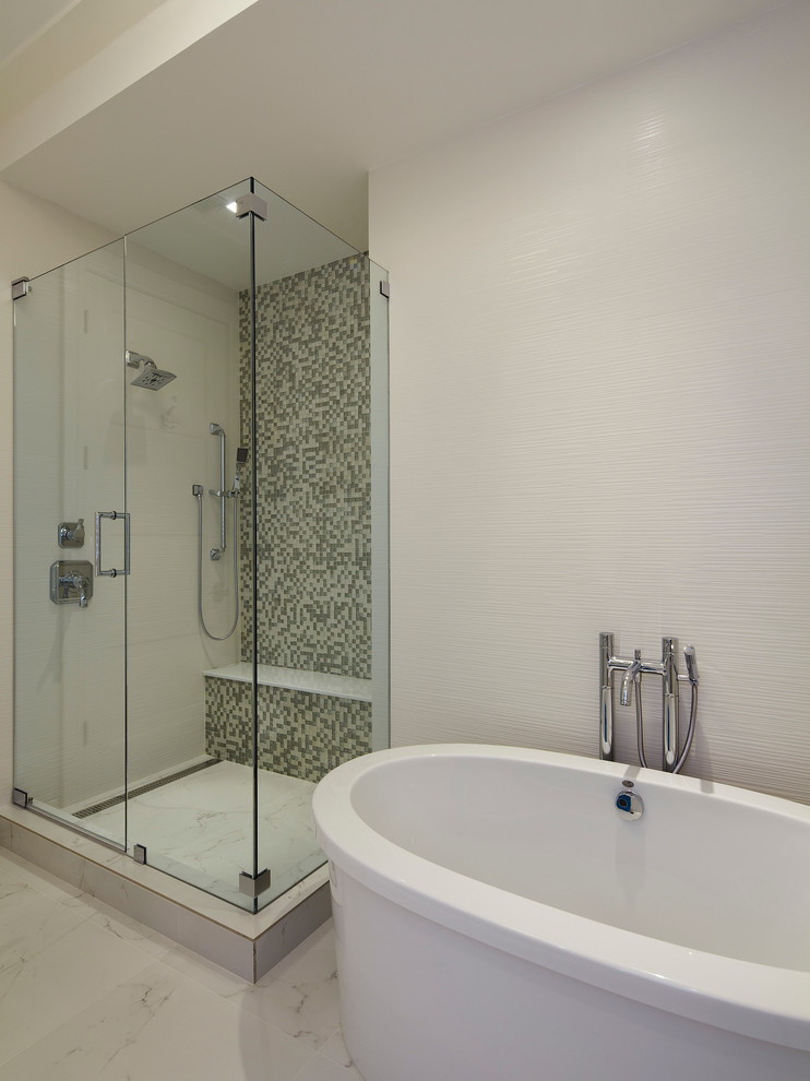 This is an example of an expansive classic shower room bathroom in Miami with recessed-panel cabinets, white cabinets, marble worktops, white tiles, ceramic tiles, a freestanding bath, a double shower, white walls and marble flooring.