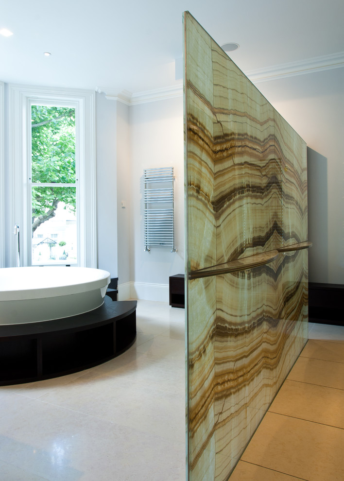 Design ideas for a contemporary bathroom in London with a built-in bath.