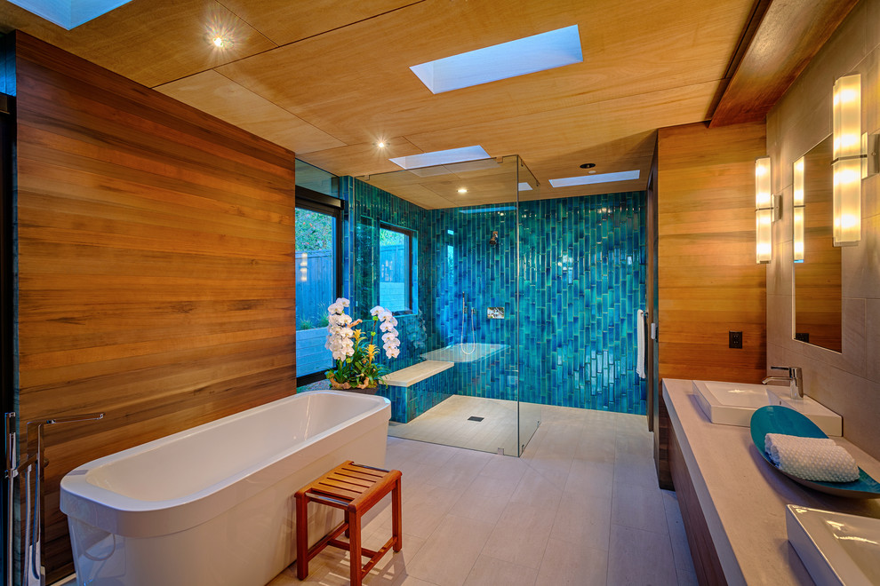 Bathroom - contemporary master beige tile bathroom idea in San Diego with a vessel sink
