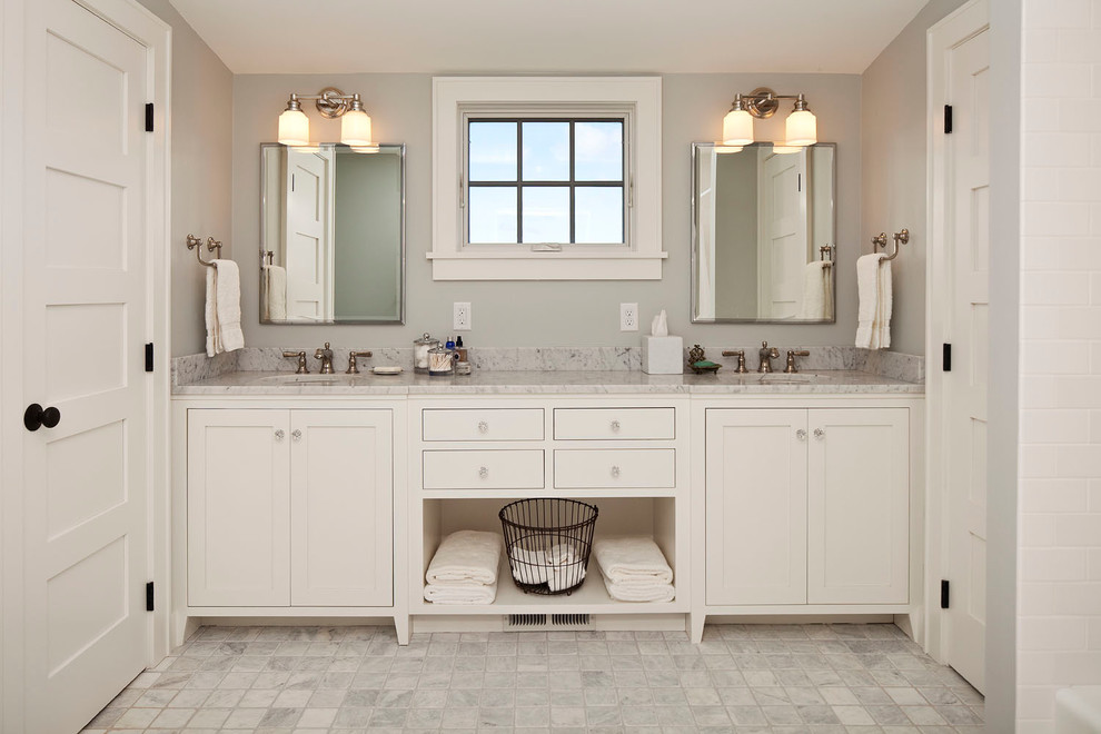 Bathroom - country bathroom idea in Minneapolis with an undermount sink, shaker cabinets, white cabinets and gray walls