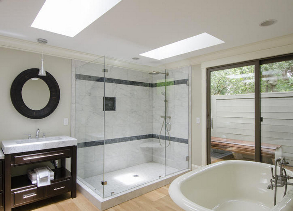 Bathroom - large coastal master porcelain tile light wood floor bathroom idea in Boston with a console sink, marble countertops and gray walls
