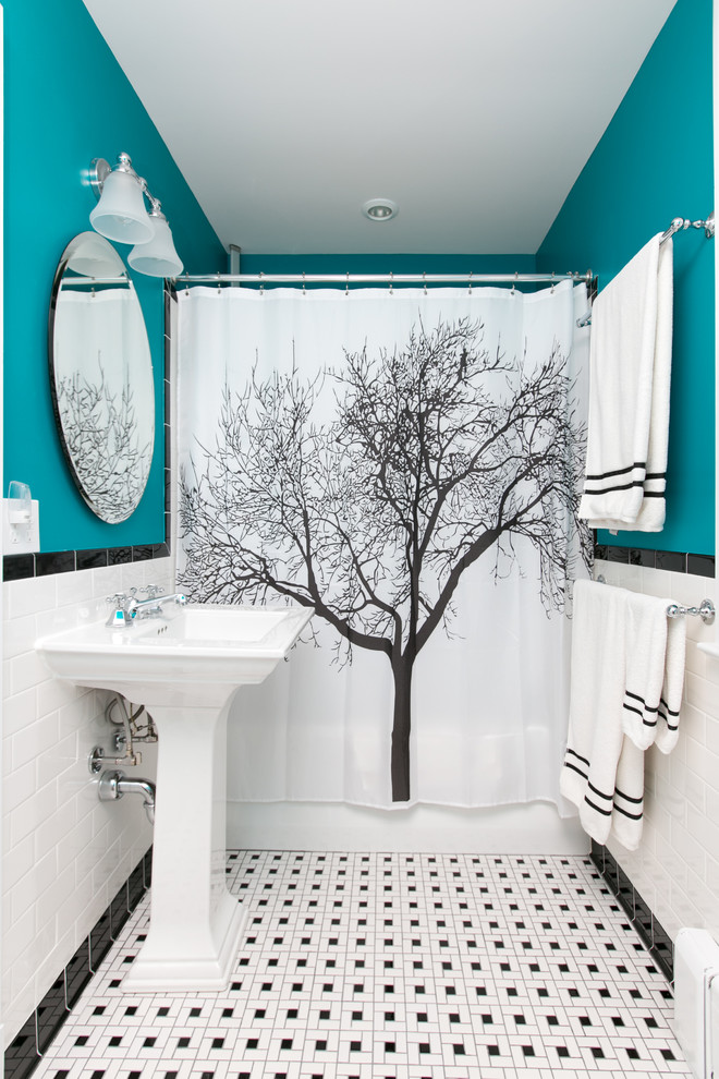 Example of a classic 3/4 black and white tile and subway tile mosaic tile floor and multicolored floor bathroom design in DC Metro with blue walls and a pedestal sink