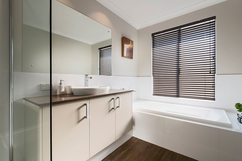 Example of a transitional bathroom design in Perth