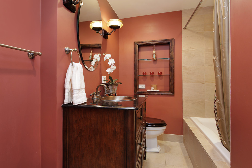Идея дизайна: ванная комната с открытыми фасадами, темными деревянными фасадами, столешницей из гранита, накладной ванной, бежевой плиткой, керамической плиткой, оранжевыми стенами и полом из керамической плитки