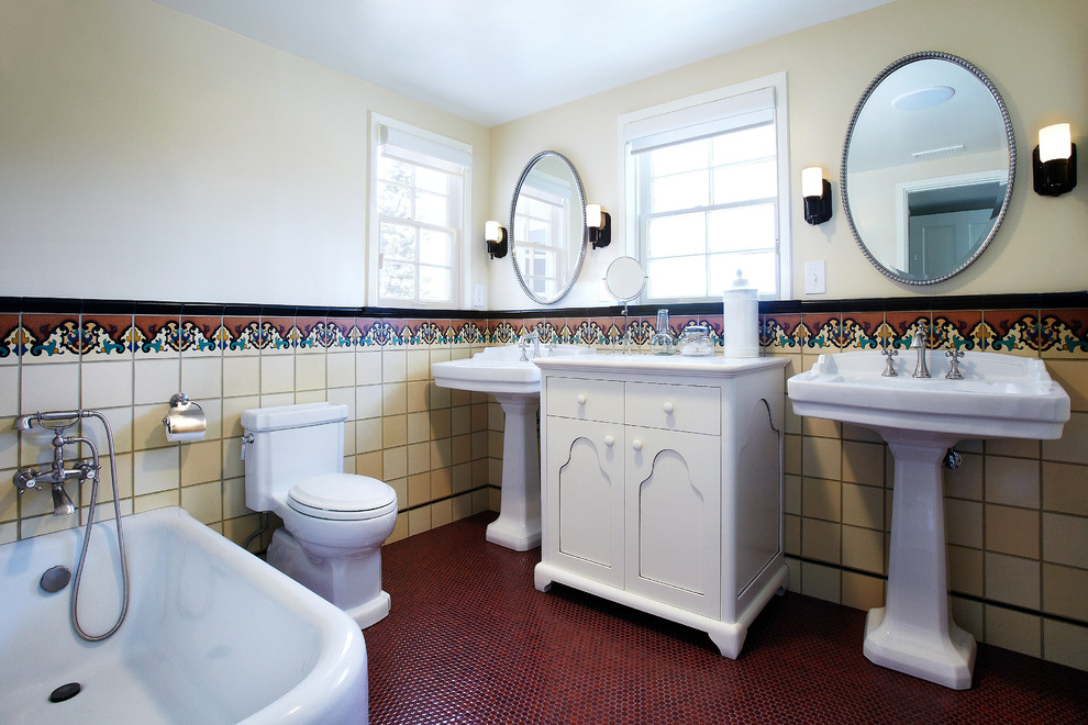 Inspiration for a mid-sized eclectic master multicolored tile mosaic tile floor freestanding bathtub remodel in Los Angeles with a pedestal sink, white cabinets and a one-piece toilet