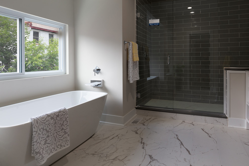 Inspiration for a large contemporary ensuite bathroom in Other with freestanding cabinets, white cabinets, a freestanding bath, a double shower, a one-piece toilet, white tiles, glass tiles, white walls, marble flooring, a vessel sink, engineered stone worktops, white floors, a hinged door and white worktops.