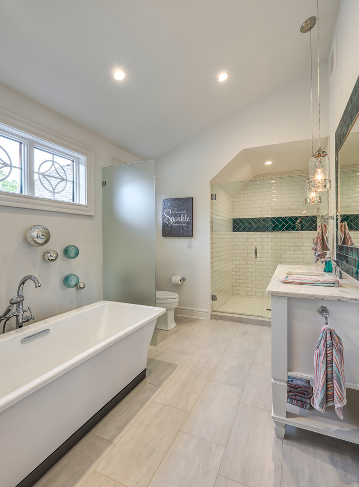 Huge transitional 3/4 porcelain tile and gray floor bathroom photo in Cincinnati with furniture-like cabinets, white cabinets, white walls, an undermount sink, marble countertops, a hinged shower door and multicolored countertops