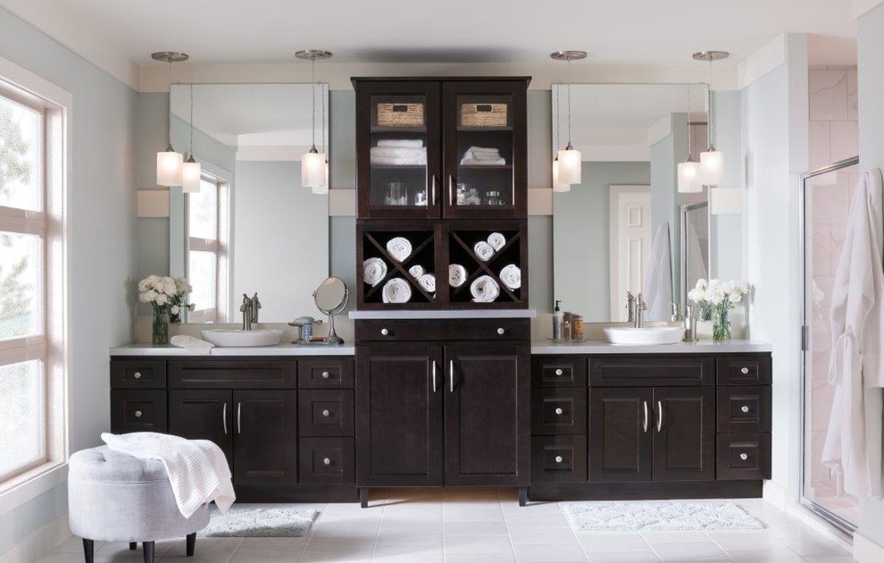Design ideas for a large classic ensuite bathroom in Nashville with beaded cabinets, dark wood cabinets, an alcove shower, white tiles, ceramic tiles, blue walls, ceramic flooring, a vessel sink, engineered stone worktops, white floors and a hinged door.