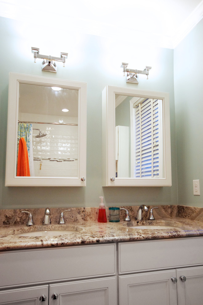 Small transitional kids' bathroom photo in Baltimore with an undermount sink, recessed-panel cabinets, white cabinets, granite countertops and blue walls