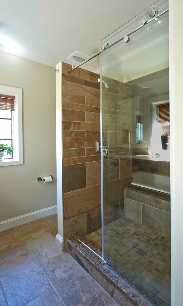 Example of a mid-sized transitional master brown tile and porcelain tile porcelain tile bathroom design in Baltimore with shaker cabinets, brown cabinets, a two-piece toilet, green walls, an undermount sink and granite countertops