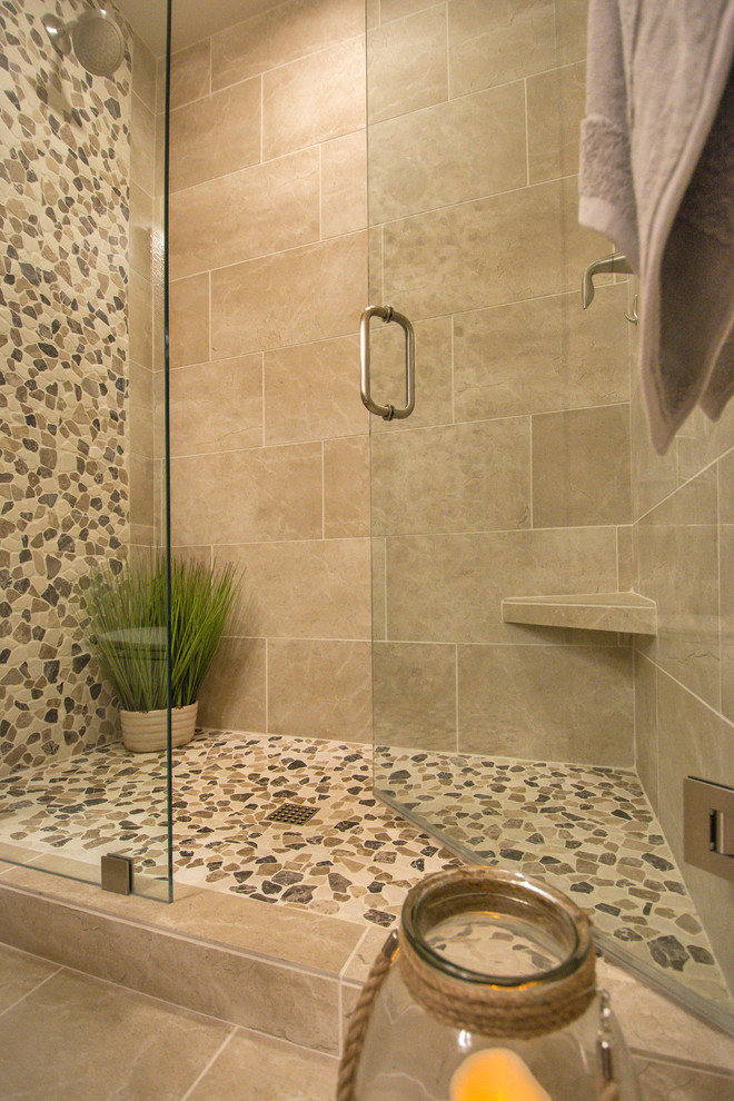 Medium sized classic ensuite bathroom in Phoenix with beige tiles, porcelain tiles, beige walls, porcelain flooring, beige floors, a hinged door, raised-panel cabinets, dark wood cabinets, an alcove shower, a two-piece toilet, a submerged sink and engineered stone worktops.