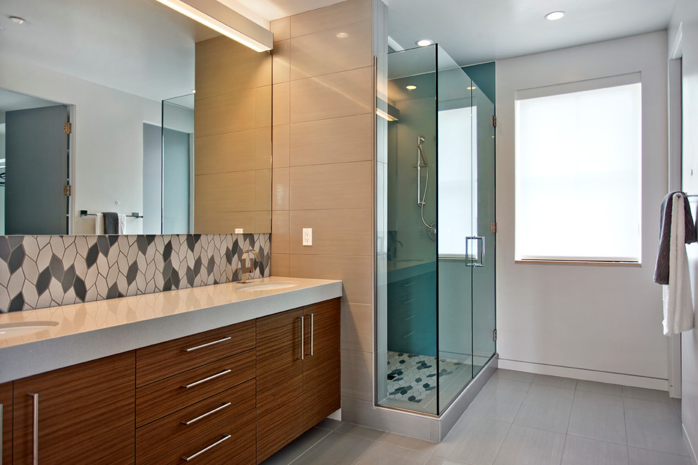 Large contemporary ensuite bathroom in Sacramento with flat-panel cabinets, dark wood cabinets, an alcove shower, black tiles, grey tiles, white tiles, mosaic tiles, white walls, porcelain flooring, a submerged sink and engineered stone worktops.