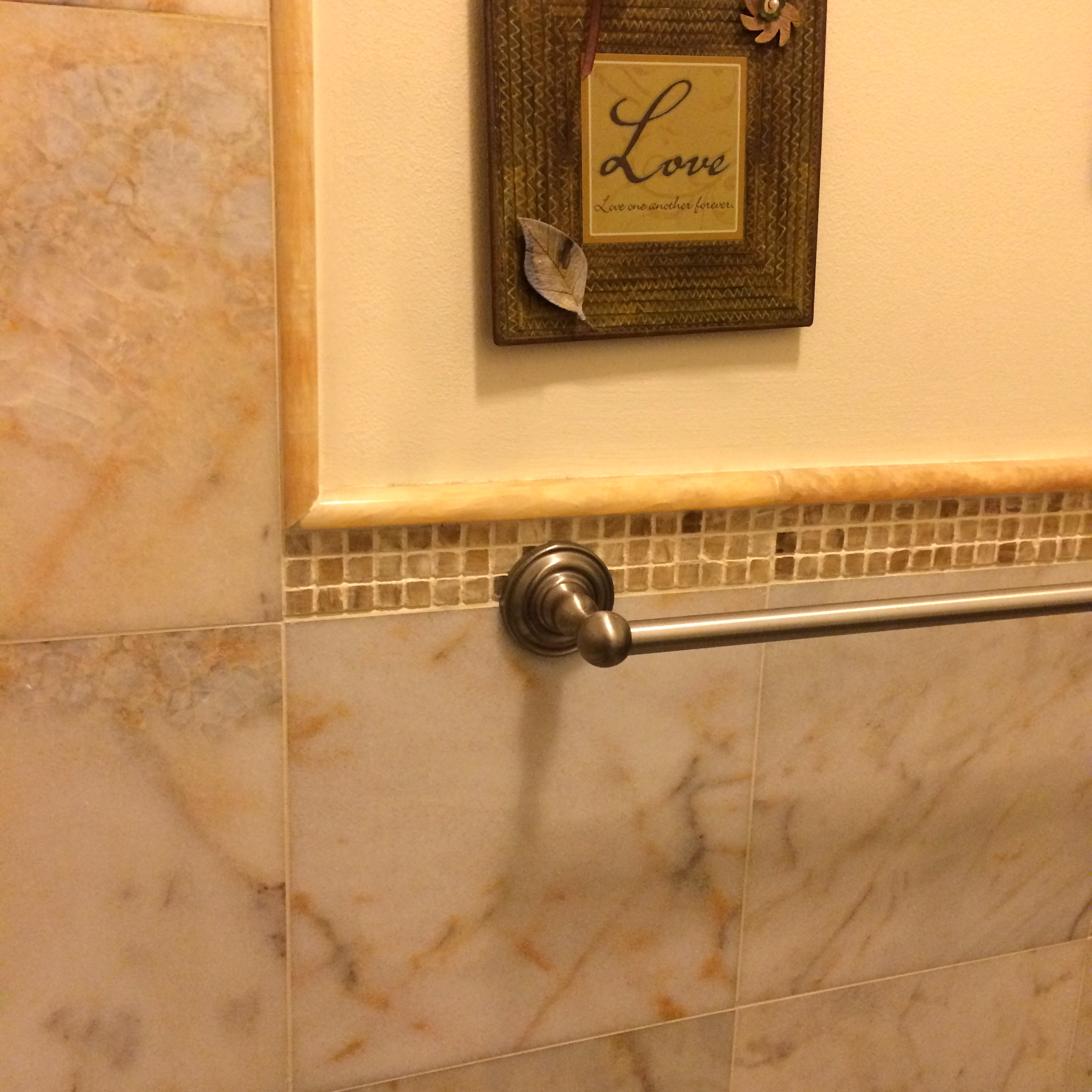 Crema Marfil Shower Shelf in bathroom with Honey Onyx Mini Mosaic wall tile  Installation