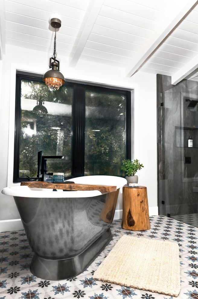 Medium sized farmhouse ensuite bathroom in Sacramento with a freestanding bath, a built-in shower, a two-piece toilet, metal tiles, white walls, mosaic tile flooring, a built-in sink, white floors, an open shower and white worktops.