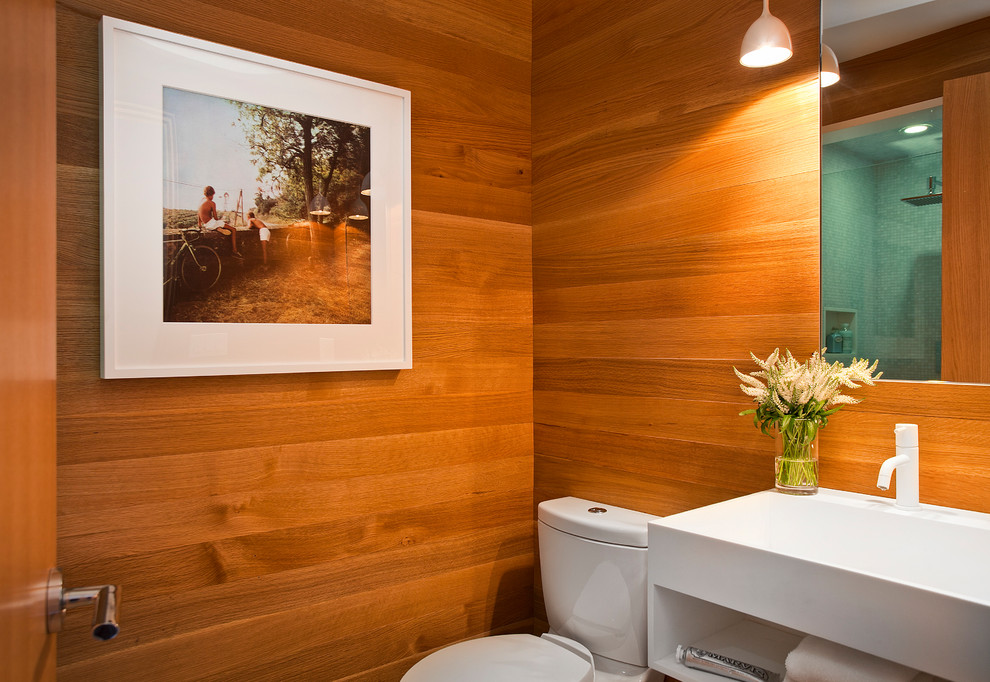 ロサンゼルスにある中くらいなコンテンポラリースタイルのおしゃれなバスルーム (浴槽なし) (アルコーブ型シャワー、一体型トイレ	、モザイクタイル、茶色い壁、コンソール型シンク、開き戸のシャワー) の写真