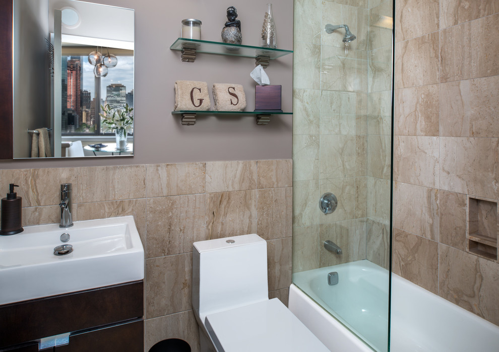 Inspiration for a transitional beige tile bathroom remodel in New York