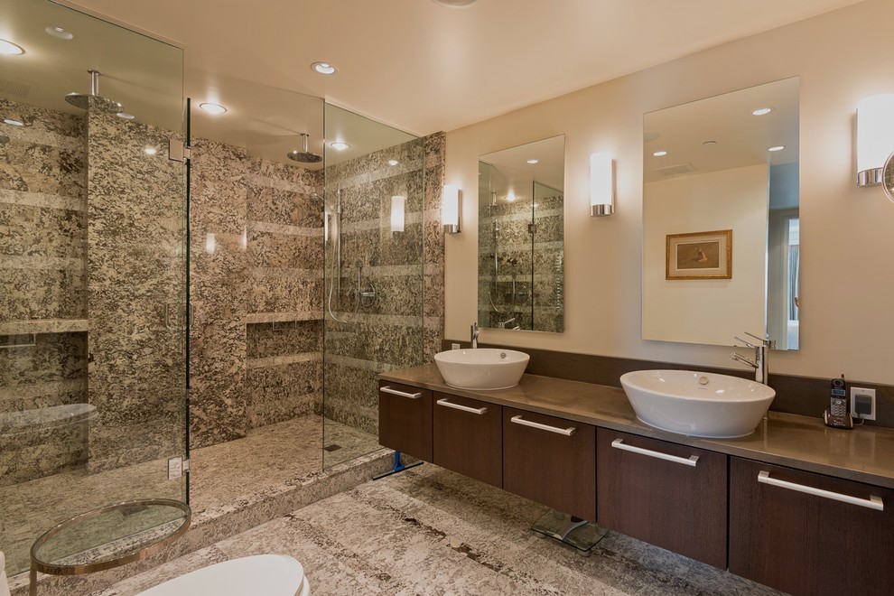 Trendy double shower photo in Vancouver with a vessel sink, flat-panel cabinets and medium tone wood cabinets