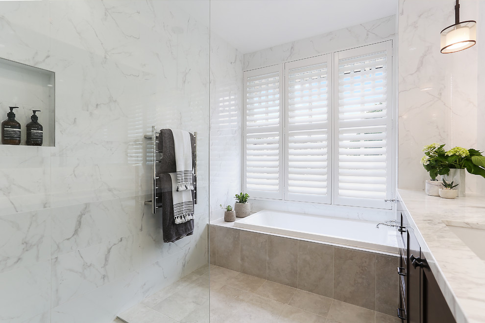 Medium sized contemporary ensuite bathroom in Sydney with beaded cabinets, dark wood cabinets, an alcove bath, a walk-in shower, white tiles, marble tiles, white walls, marble flooring, an integrated sink, marble worktops, grey floors and an open shower.