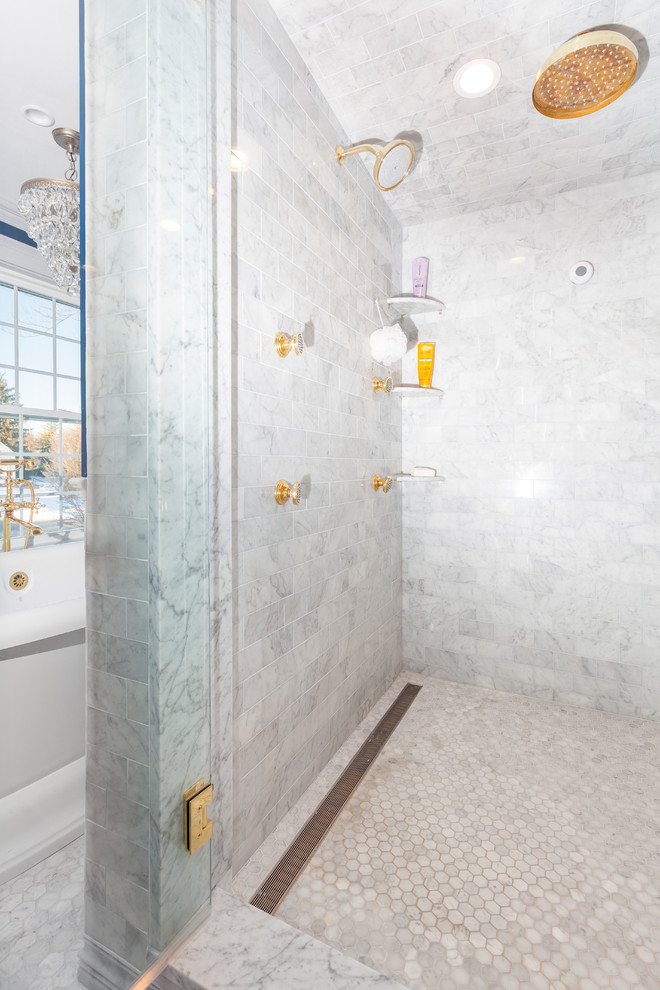Inspiration for a mid-sized timeless master gray tile and marble tile marble floor and gray floor bathroom remodel in Boston with a one-piece toilet, blue walls, an undermount sink, marble countertops, a hinged shower door and gray countertops