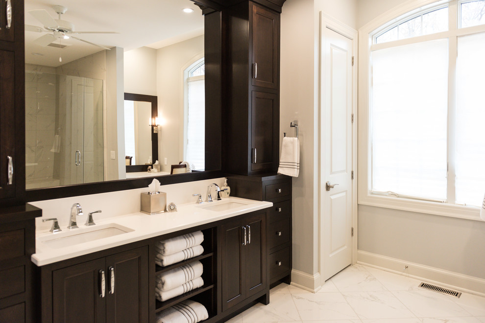 Inspiration for a huge transitional master white tile and ceramic tile ceramic tile double shower remodel in Chicago with beaded inset cabinets, dark wood cabinets, a one-piece toilet, gray walls, an undermount sink and quartz countertops